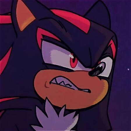 A picture of Shadow the Hedgehog with a scowl on his face, glaring off screen and showing his teeth